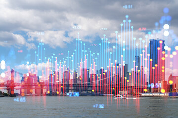 Double exposure of New York cityscape with digital graphs, blue and red tones dominate, urban...