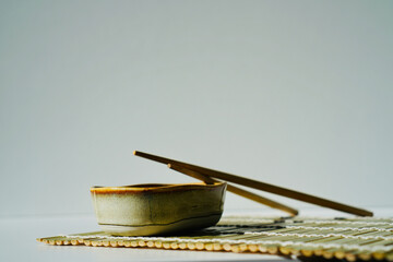 chopsticks and bowl of soy sauce