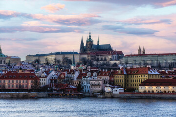 Old town of Prague. Czech Republic over river Vltava with Saint Vitus cathedral on skyline.