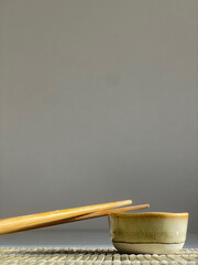 chopsticks and bowl of soy sauce