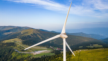 Wind mill on a mountain ridge at the Handalm and Weinebene mountain area in Styria, Austria