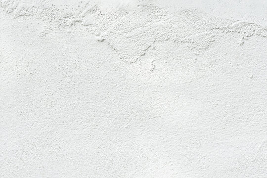 Blank concrete white rough wall for background. Beautiful white wall surface background pattern..