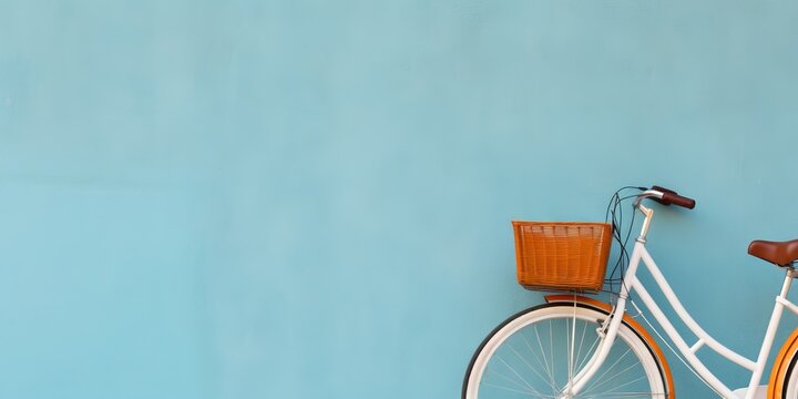 Cute bike with a basket of flowers. Banner with copy space. Concept: rental of transport for street walks, active recreation with the family in nature