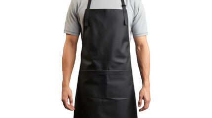 A man confidently wears a black apron in a modern kitchen setting