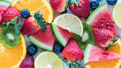 A close up macro view of a pile of fresh fruit pieces.