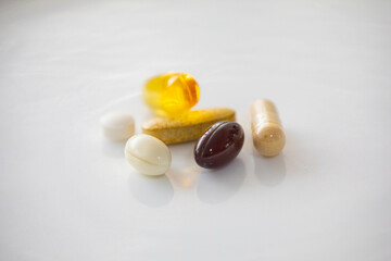 Medicines, tablets, capsules isolated in selective focus. Vitamin D