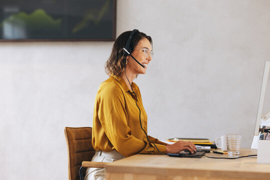 Female tech support agent managing call center operations