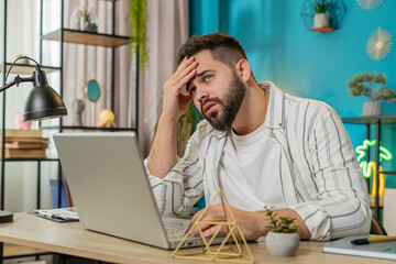 Sad frustrated pensive Caucasian man unrequited love suffers from unfair situation bankruptcy....