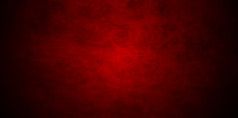 Fototapeta premium Red stone wall texture grunge rock surface. dark red concrete light maroon backdrop. wide panoramic banner. old wall stone for dark red distressed grunge background wallpaper rough concrete wall.