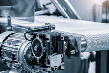 Automatic packaging conveyor line in pharmaceutical factory or food actory, pharmaceutical or food industrial concept background