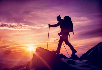 Silhouette of a hiker on mountain top cliff edge at sunset background. Hiking adventure concept - 766466189
