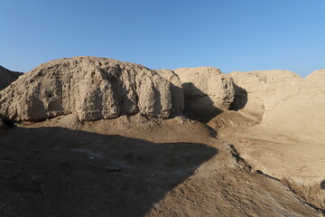Ancient city of kish , 3100 bc , al-ahmar hill in Babylon in Iraq , ancient ruins with blue sky 