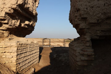 Ancient city of kish , 3100 bc , al-ahmar hill in Babylon in Iraq , ancient ruins with blue sky 