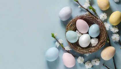 banner with easter eggs on a light blue background. Top view, flat lay with a big copy space. - obrazy, fototapety, plakaty