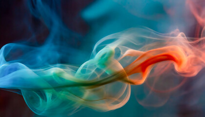 Obraz premium Dynamic dance of colorful smoke, intertwining in a graceful ballet. Vibrant mix of blue, green, red, and orange hues.