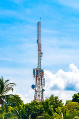Red white 5G tower radiation in Puerto Escondido Mexico.