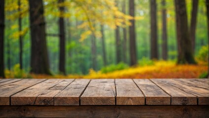 A tranquil image showcasing a wooden table with a beautiful blurred background of an autumnal forest