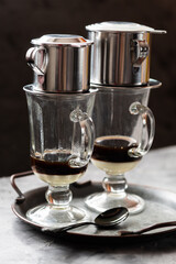 Pour over coffee by phin metal filter with condensed milk in Vietnamese style - 766496306