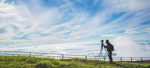 man asians travel relax in the holiday. Photograph landscape on the Moutain.Thailand - 766497118