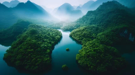 A drone show of a mountain river engulfed in mist © Dusko