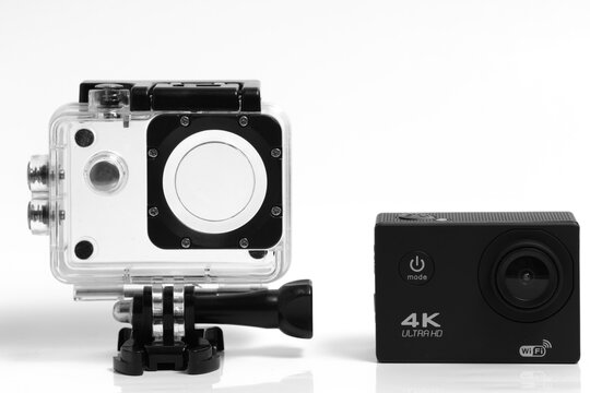 4K action camera on a white background and waterproof case.