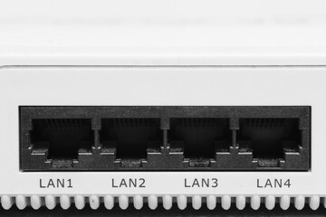 Four lan inputs on the back of the modem. - obrazy, fototapety, plakaty