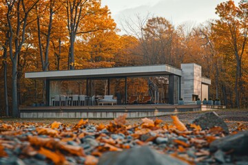 Exterior of ultramodern cottage in the wilderness during autumn foggy morning - obrazy, fototapety, plakaty