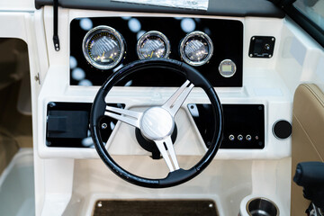 Cockpit of luxury yacht with dashboard.