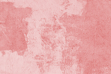 Old stucco plaster surface, concrete wall background, close up grunge texture of red painted cement...