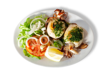 Grilled squid served with lemon and vegetables