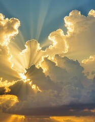 Sunbeams burst through a magnificent cloudscape, illuminating the edges of the clouds with golden light, offering a breathtaking vision of ethereal beauty.