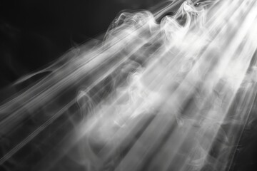 White smoke or cloud with light rays or sunbeams on black background