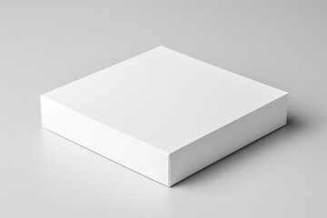 Single empty magnet white cardboard box with blank label on a solid white background, the box has a delicate texture visible on the surface, emphasizing material quality,