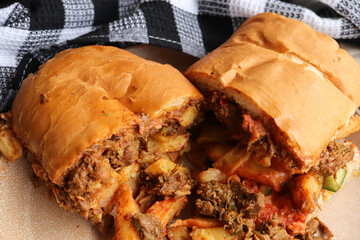 Masala steak gatsby. South African fast food called a Gatsby. Large bread roll usually fill with chips and meat. 