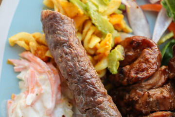 South African braai. Boerewors and salad