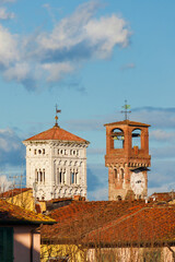 Lucca medieval clocktower and St Michael bell tower - 766544366