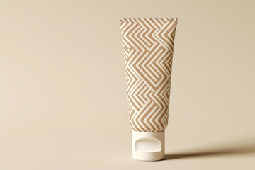 Contemporary cosmetic cream tube with a bold geometric pattern on a soft beige isolated solid background, showcasing modern trends in beauty packaging,