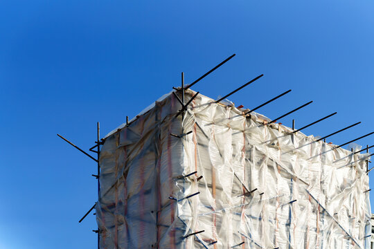 The scaffolding is completely covered with film
