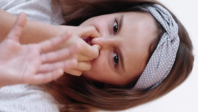 Vertical disgusted child yuck kid little girl