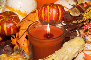 Christmas still life with candle and decorations