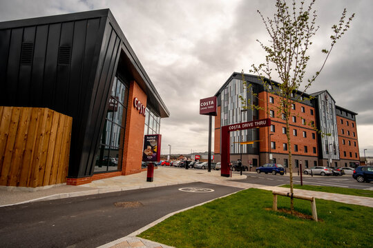  Drive through Costa coffee shop at Gloucester quays in the UK showing the surrounding buildings.