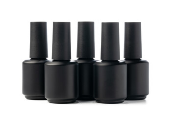 Black bottle of nail polish isolated on white background