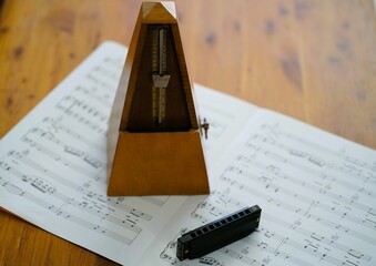 Metronome and harmonica