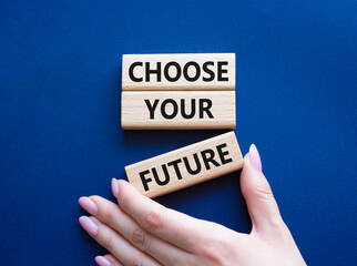 Choose your future symbol. Wooden blocks with words Choose your future. Beautiful deep blue...