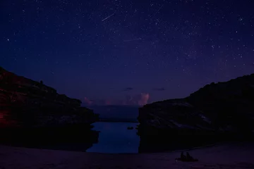 Crédence de cuisine en verre imprimé Plage de Camps Bay, Le Cap, Afrique du Sud Long exposure view of shooting stars from Anse bouteille in Rodrigues island at night