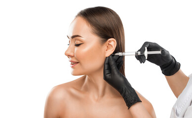 Cosmetologist does anti wrinkle injections of a beautiful woman. Women's cosmetology in the beauty...