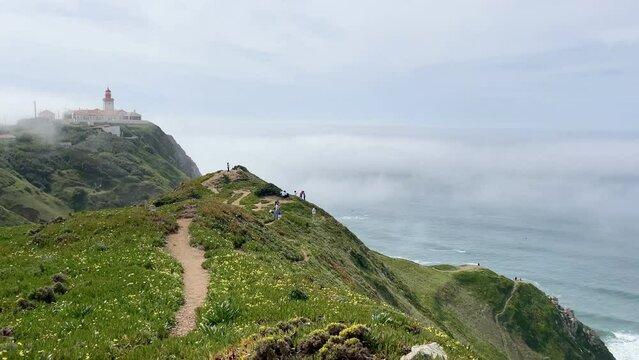 Panoramic view of Cabo da Roca with lighthouse, westernmost point of Europe in Sintra-Cascais National Park, Portugal.