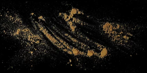Poster Ginger root powder pile isolated on black, top view © dule964