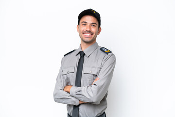 Young safeguard man over isolated white background with arms crossed and looking forward
