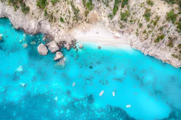 Papier Peint photo Lavable Turquoise Summer holiday background. Aerial view of seascape with a beautiful stone coastline and with a small beach. Sea coast with blue, turquoise clear water on a sunny day